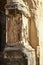 Vertical shot of the details on the ruins of the historical Arch of Septimius Sev in Rome, Italy