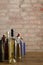 Vertical shot of different types of bottles of alcoholic drinks.Wine, whiskey, vodka and other drinks on the bar counter against o