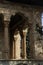 Vertical shot of an elaborate stone building grand columns arched windows