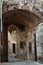 Vertical shot of entrance in the old town of Arco de Santa Ana in Caceres,â€Ž Spain