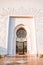 Vertical shot of the entrance of Sheikh Zayed Grand Mosque in Abu Dhabi, UAE