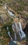 Vertical shot of the Ezaro waterfall in Galicia, Spain