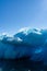 Vertical shot of a floating glacier piece in Alaska, USA