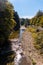 Vertical shot of the flowing river near the Irabia reservoir in Ochagavia, Spain