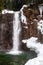 Vertical shot of a Franklin Falls in winter in Washington