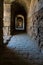 Vertical shot of a gallery in the Roman amphitheater of Italica in Santiponce, Sevilla, Spain