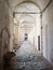Vertical shot of the hallway in the famous Certosa of Padula in Italy