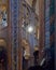 Vertical shot of the hanging botafumeiro inside a church with special lighting