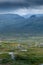 Vertical shot of harsh arctic landscape of Swedish Lapland in Stora Sjofallet national park with dramatic sky and weird