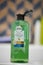 Vertical shot of Herbal Essences brand Potent Aloe skin gel in an open bottle