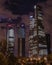 Vertical shot of high-rise buildings at the Plaza Castilla, Madrid, Spain at night