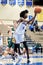 Vertical shot of the high school indoor basketball game Lighthouse vs Whiting in East Chicago