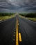 Vertical shot of a highway on a cloudy day