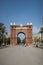 Vertical shot of the historic brick Arco de Triunfo in Barcelona, Spain