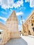 Vertical shot of historic Karya Siddhi Hanuman Hindu Temple on a sunny day