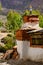 Vertical shot of the historic Tibetan Buddhist holy site Ghar Gumba Monastery in the Himalayas