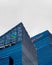 Vertical shot of an HSBC building rooftop in Singapore during daytime