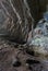 Vertical shot of the inside of a rocky cave in Skrad, Croatia