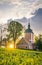 Vertical shot of the Kreuzbergkirche church at sunset with a cloudy sky in the background, Germany