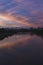 Vertical shot of a lake in a park during sunset in Wilmington, Delaware