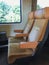 Vertical shot of the leather seats of a train