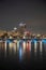 Vertical shot of the Longfellow Bridge with the background of the cityscape of Boston