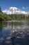 Vertical shot looking across Bench Lake to Mount Rainier