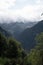 Vertical shot of a majestic valley landscape from a mountaintop in Italian Dolomites