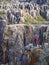 Vertical shot of a male standing on a canyon in Cerro del Hierro, Sevilla, Spain
