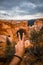 Vertical shot of a man\'s hand showing peace sign in Bryce Canyon National Park, Tropic USA