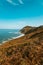 Vertical shot of the massive cliffs of the north of spain during a sunny and bright day