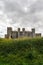 Vertical shot of a medieval Castle of Obidos in Portugal on a rainy day