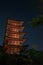 Vertical shot of the Miyajima Island Temple captured at night in Japan