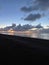 Vertical shot of Morecambe Bay in Cumbria, England under a cloudy sky at sunset