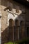 Vertical shot of the Mudejar arches partially inside the Alcazar palace, Seville, Spain