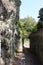 Vertical shot of a narrow bridge passage over a dried water canal