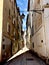 Vertical shot of a narrow street in Toulon City center, France