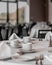 Vertical shot of neat tables in a nice, empty and clean restaurant