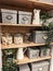 Vertical shot of neatly organized pantry with boxes and jars