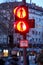Vertical shot of not working traffic lights in Cologne city, Germany in the late afternoon