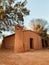 Vertical shot of the old adobe church Oratorio de los Orquera in Catamarca, Argentina