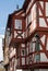 Vertical shot of old red decorative buildings in St. Aldegund, Moselle, Germany