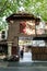 Vertical shot of an old residential building in Former French Concession with a wooden doorway