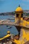 Vertical shot of the old yellow watchtower at the Forte de Sao Tiago beach of Funchal, Madeira