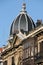 Vertical shot of an ornate dome adorns the top of a traditional building in Bilbao, Basque Country