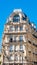 Vertical shot of a Parisian building heading the street on Square des Batignolles