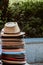 Vertical shot of a pile of hats on a blurred background