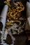 Vertical shot of a pile of jewelry in a casket with a blurry background