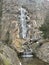 Vertical shot of Pissevache waterfall in Switzerland