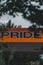 Vertical shot of a pride sign on an orange and red board
